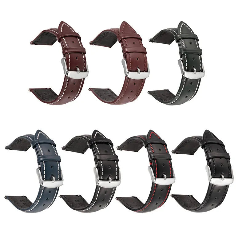 Quick release leather watch strap in black on a watch, showing the ear leather attachment and quick release tabs.
