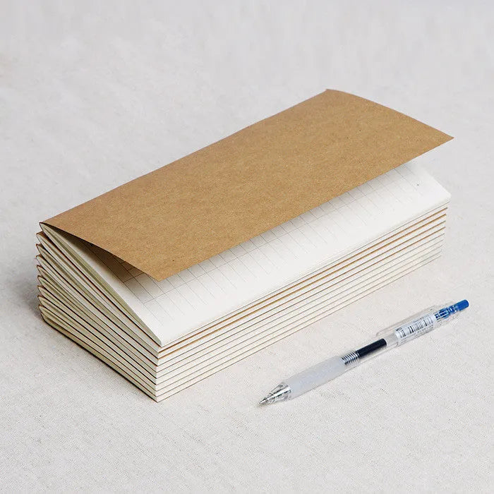 11x21cm cowhide diary refill notebook with saddle stitch binding and ivory white paper pages.