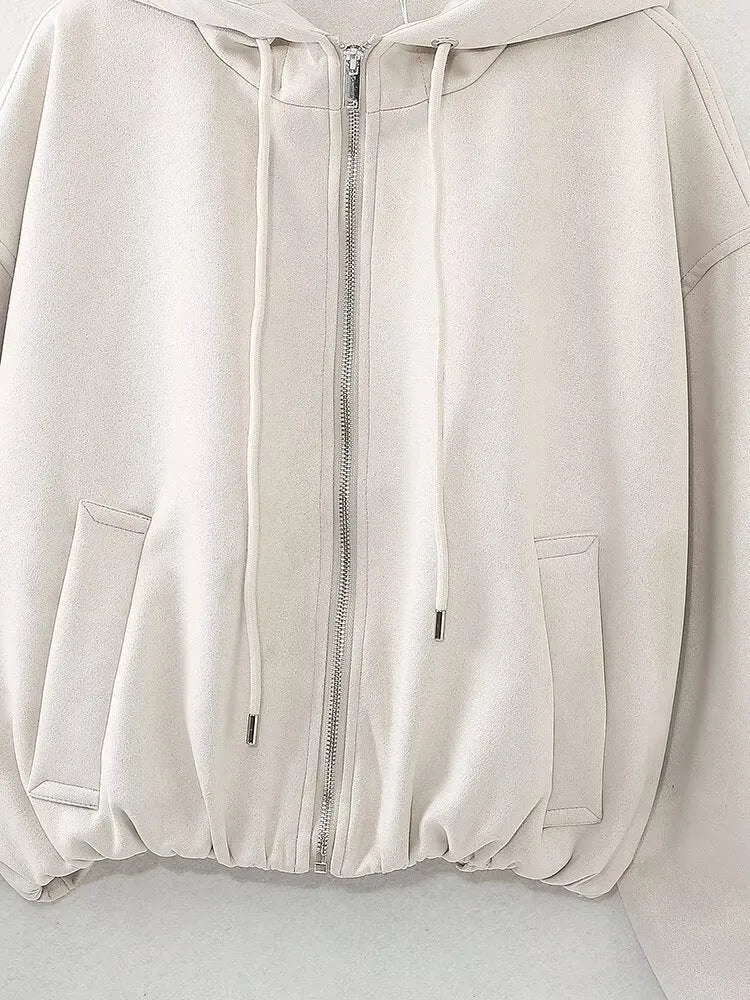 Women's suede hooded jacket in white and black colours showing casual styling