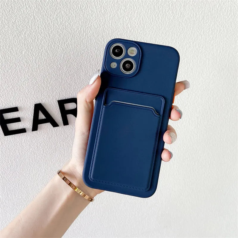 Sky blue colour block silicone iPhone case with a built-in card slot on the back.