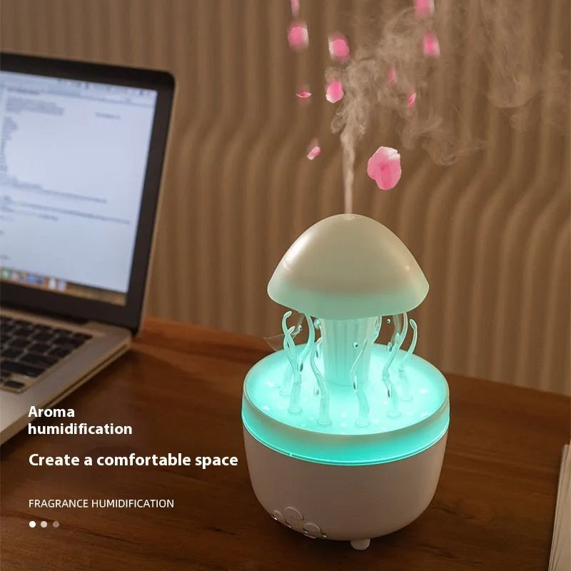 Rotating water drop aroma diffuser column humidifier with colourful LED lights in marble gold finish