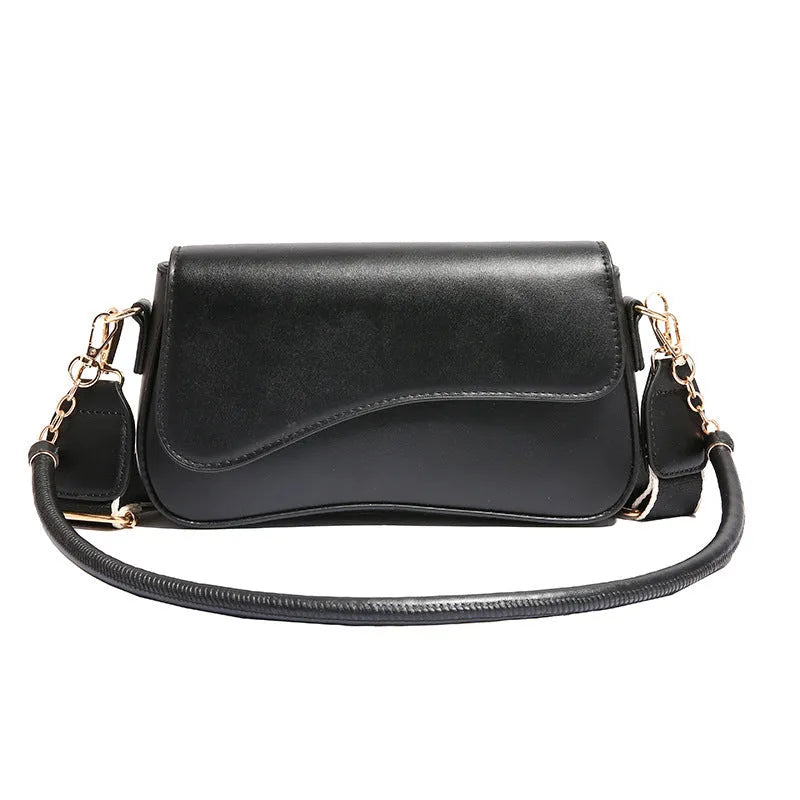 Retro women's messenger bag in black PU leather with horizontal square shape and double shoulder straps.