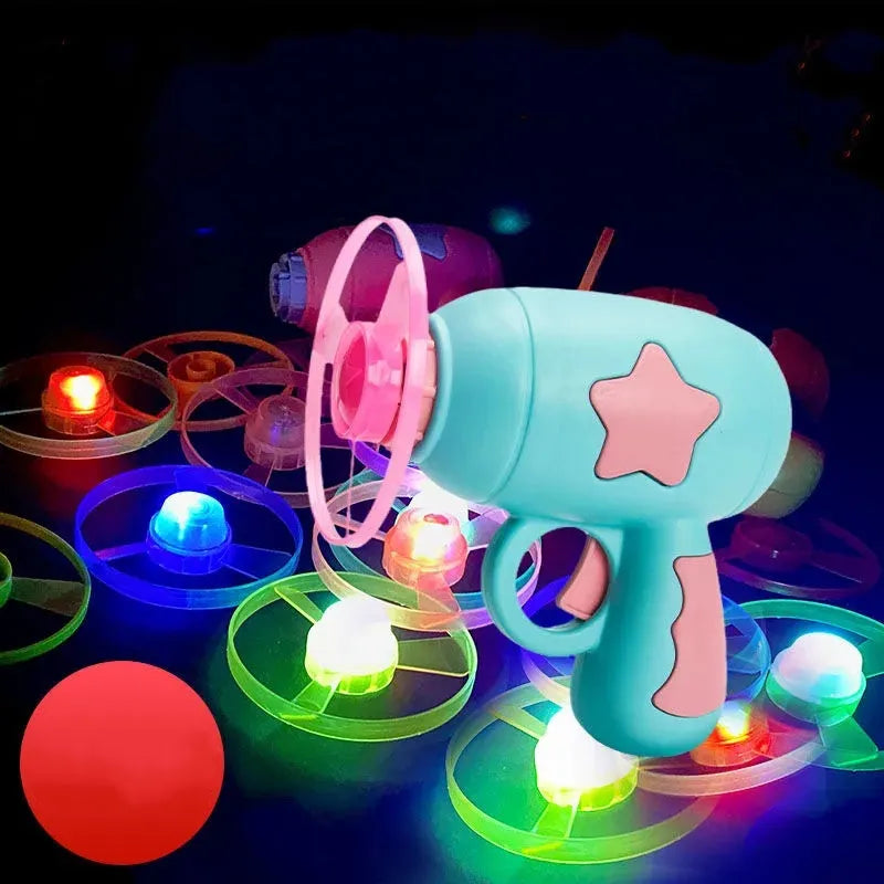 Flying saucer launcher toy set with LED flashing discs and launcher gun in assorted colours