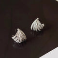 Geometric zircon earrings with platinum electroplated finish and line design