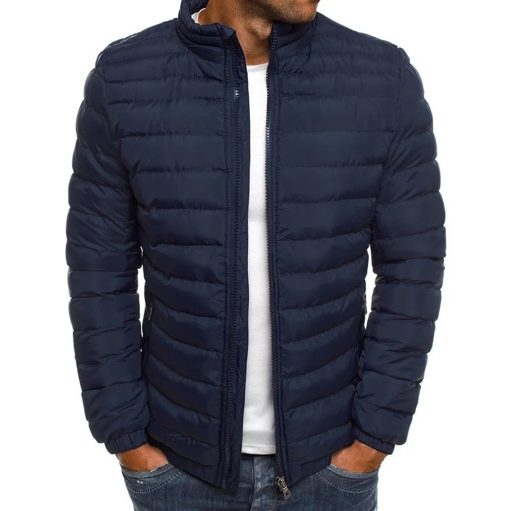 Men's thickened padded jacket with full-length zip, zipped pockets, and solid colour design in gray, black, or navy blue.
