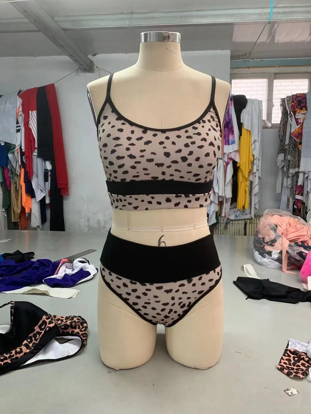Women's high waist bikini swimsuit in leopard print and white colour options.