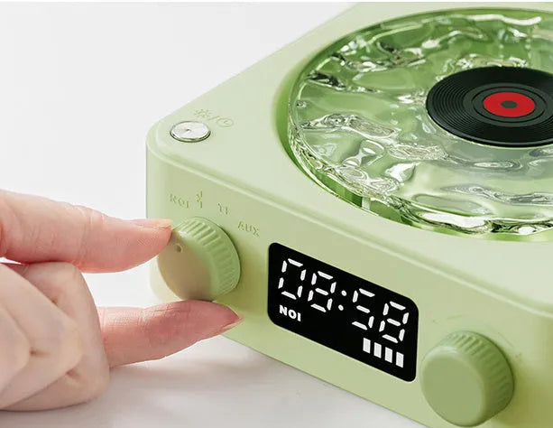 Retro Bluetooth speaker with rotating transparent turntable and RGB lighting projection
