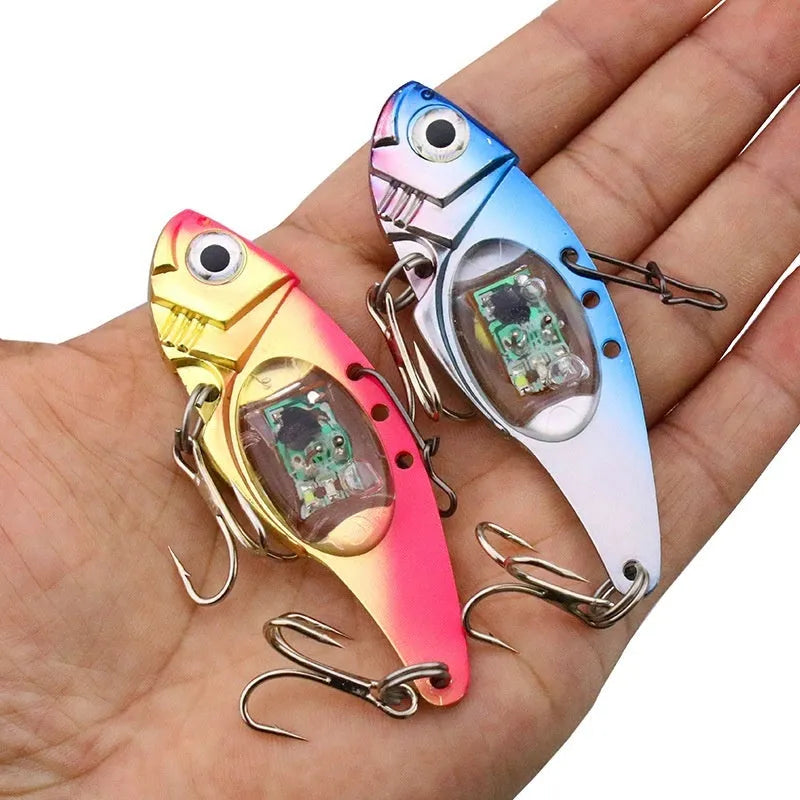 Electronic luminous metal vib fishing lure showing blue body and red body colour options