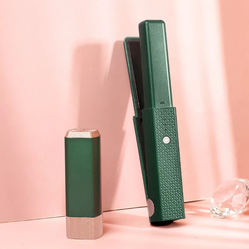 Pink and green cordless USB hair straightener and curler with ceramic plates, shown with USB cable.