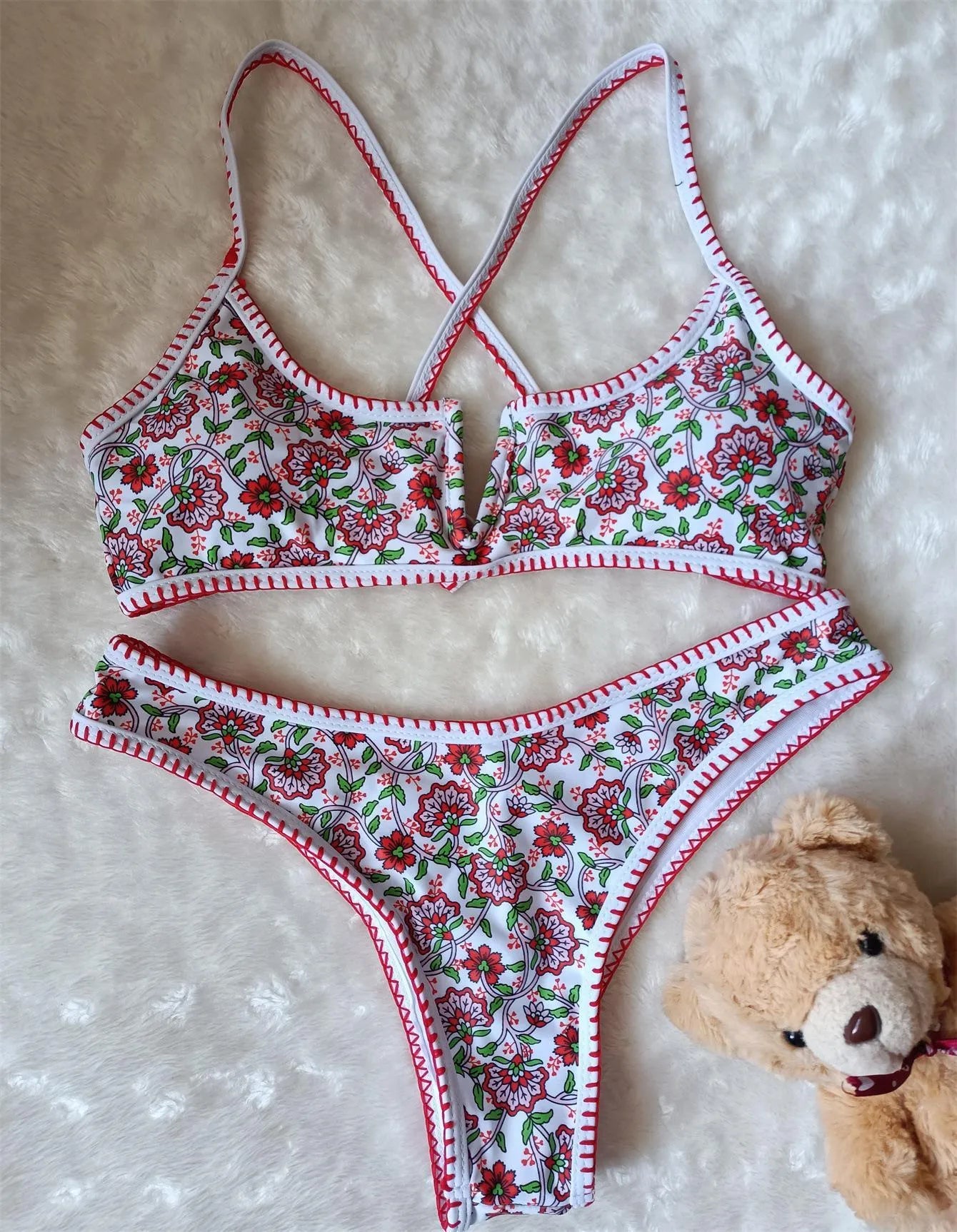V-neck floral print swimsuit with embroidery detail in quick-drying polyester fabric