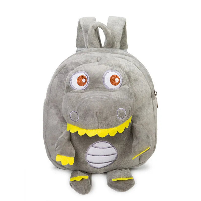 Soft plush dinosaur backpack for children with embroidery detailing in blue colour