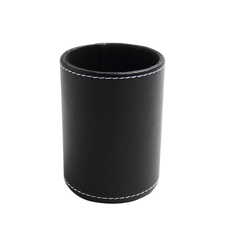Black leather cylindrical pen holder measuring 8cm wide × 10.8cm tall on desk