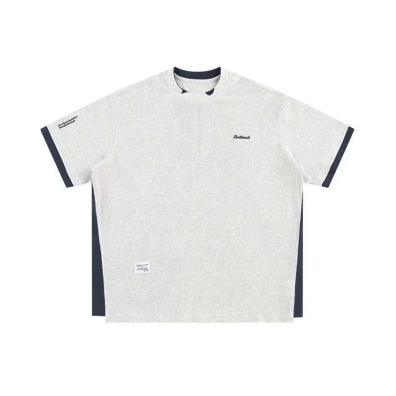 Retro loose waffle short-sleeved t-shirt with embroidered alphabet design in navy blue.