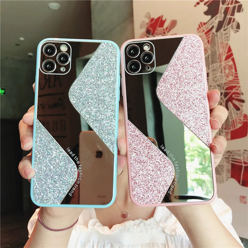 A glitter mirror finish iPhone case with personalised rhinestone detailing, shown in black, blue, and pink colours.