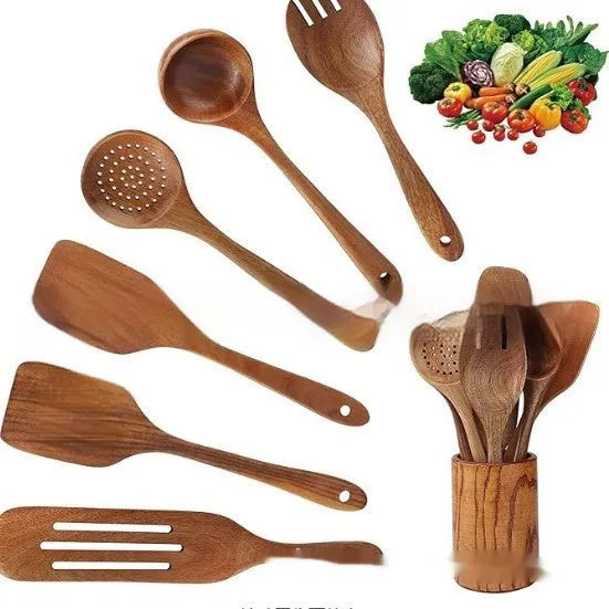 Seven-piece wooden kitchen utensil set including various spoons and spatulas on a table.