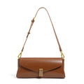 Beige cowhide leather women's cross-body bag with clamshell opening showing internal organisation pockets