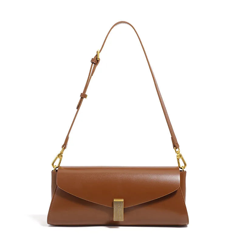 Beige cowhide leather women's cross-body bag with clamshell opening showing internal organisation pockets