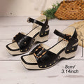 Women's white chunky heel sandals with a square toe and metal buckle closure on a rubber sole.
