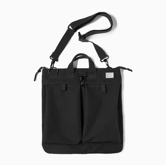 Canvas crossbody messenger bag in retro style with shoulder strap, showing internal phone pocket and 15-inch laptop capacity