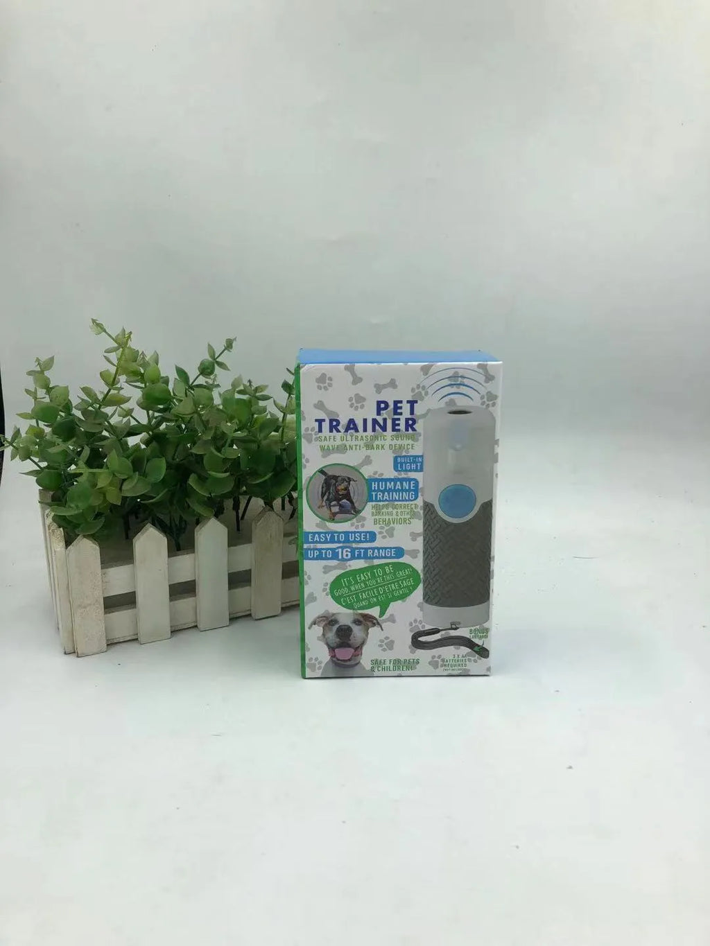 White handheld ultrasonic dog trainer device for bark control with ABS plastic construction