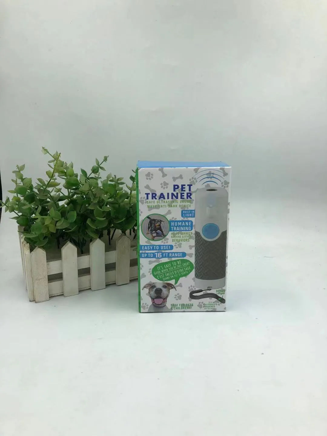 White handheld ultrasonic dog trainer device for bark control with ABS plastic construction