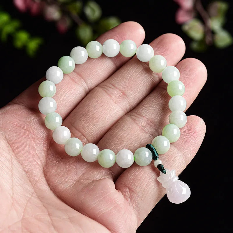 Ice jade unisex bracelet with 8mm flower purse style and Chinese national design