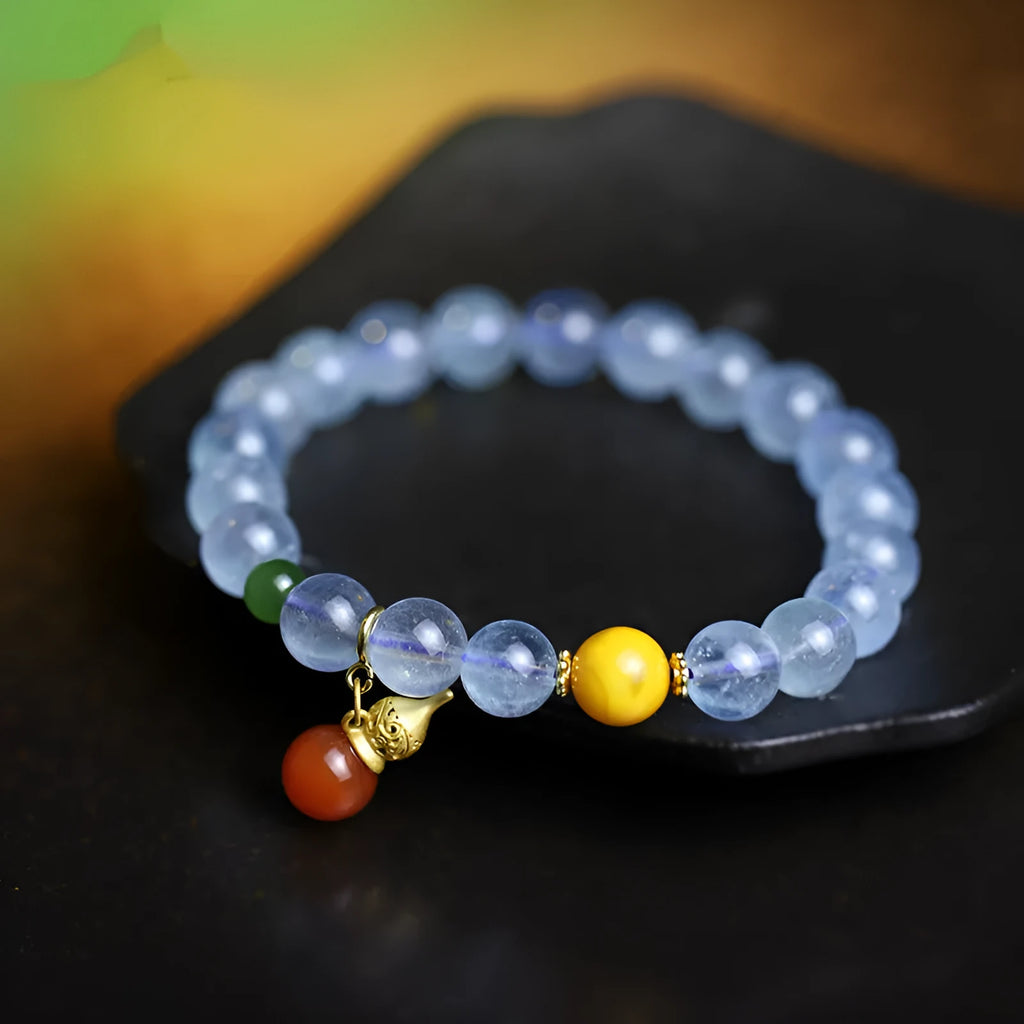 Iced aquamarine crystal bracelet with 8mm geometric beads and ethnic retro styling