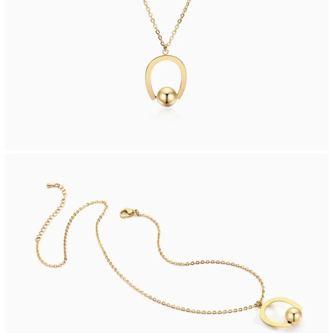 Adjustable stainless steel necklace with cross chain design and geometric pendant in gold colour.