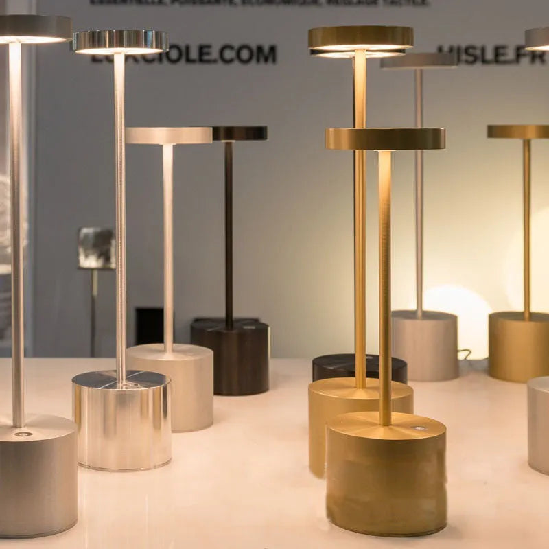 Aluminium rechargeable touch desk lamp in silver finish showing dimmable LED light.