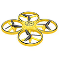 Gesture sensing flying saucer toy with ABS plastic body and four-axis design on white background