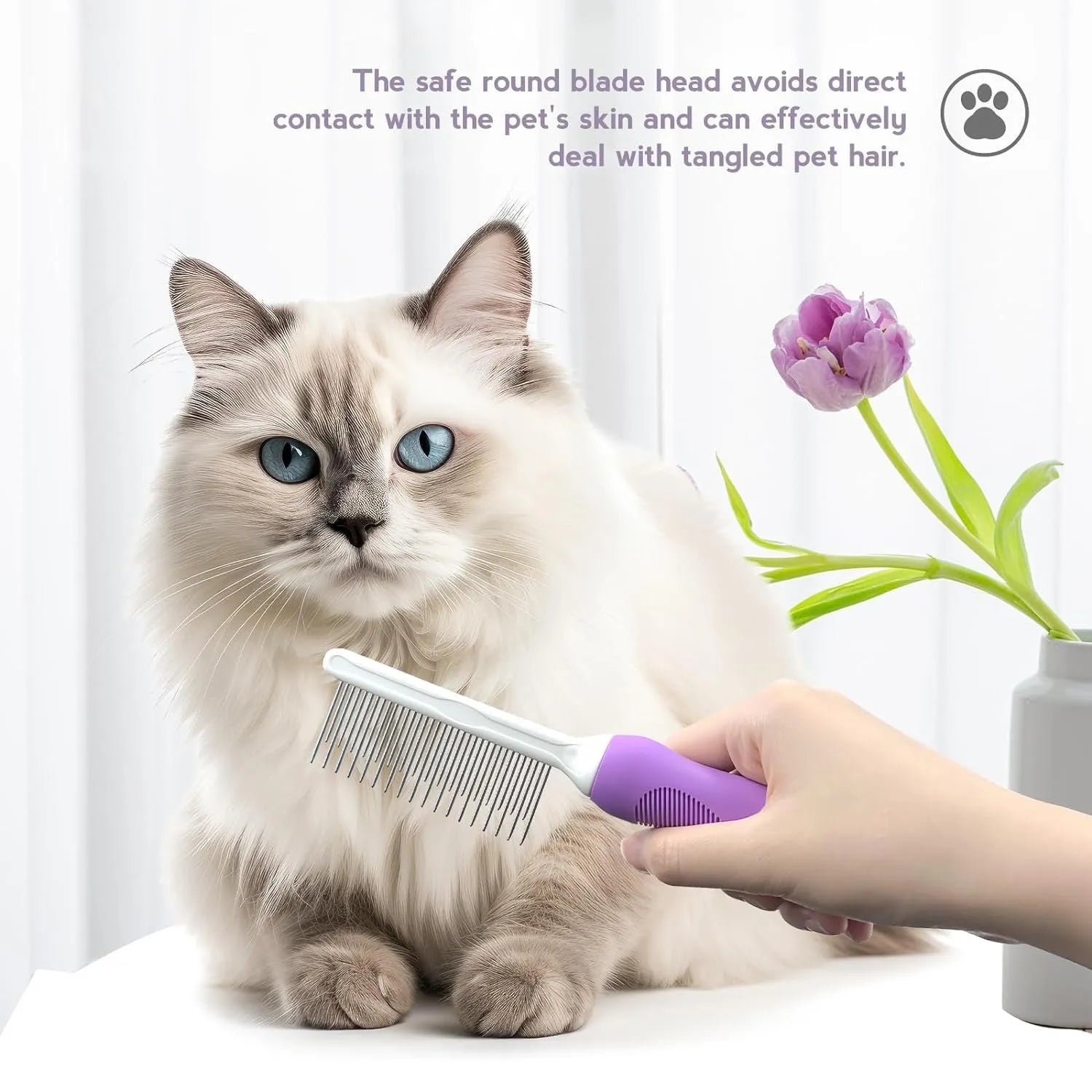 Purple pet detangling comb with stainless steel teeth and ergonomic handle on white background.