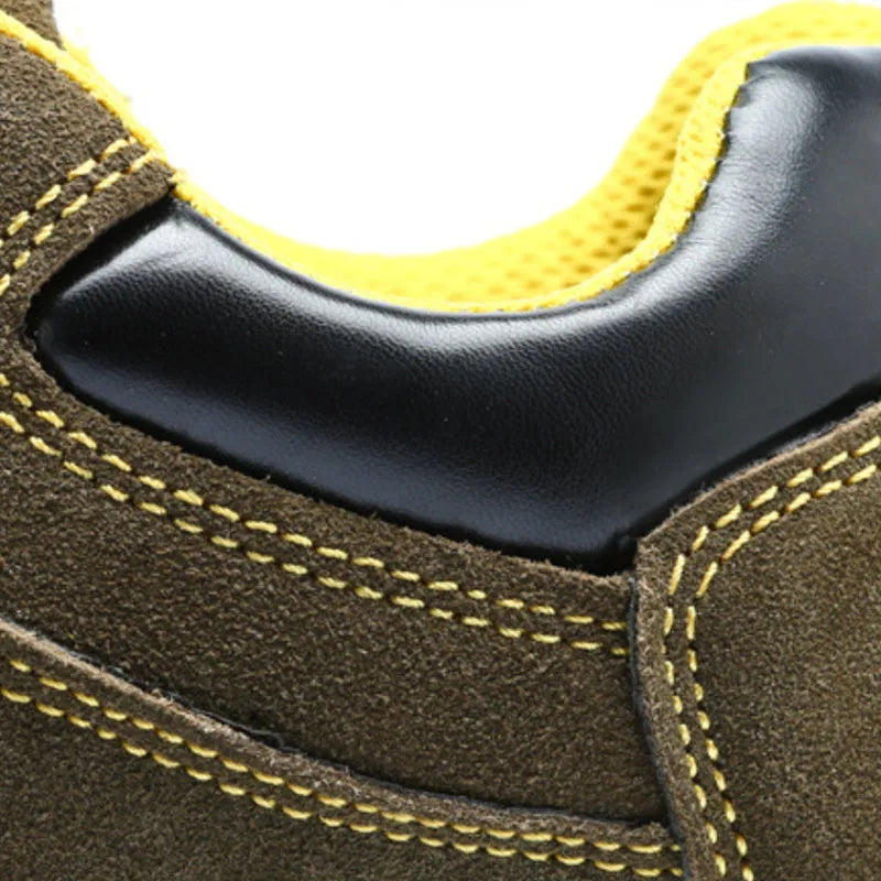 Bronze coloured men's low-cut safety boots with cow suede upper and steel toe cap on anti-slip sole