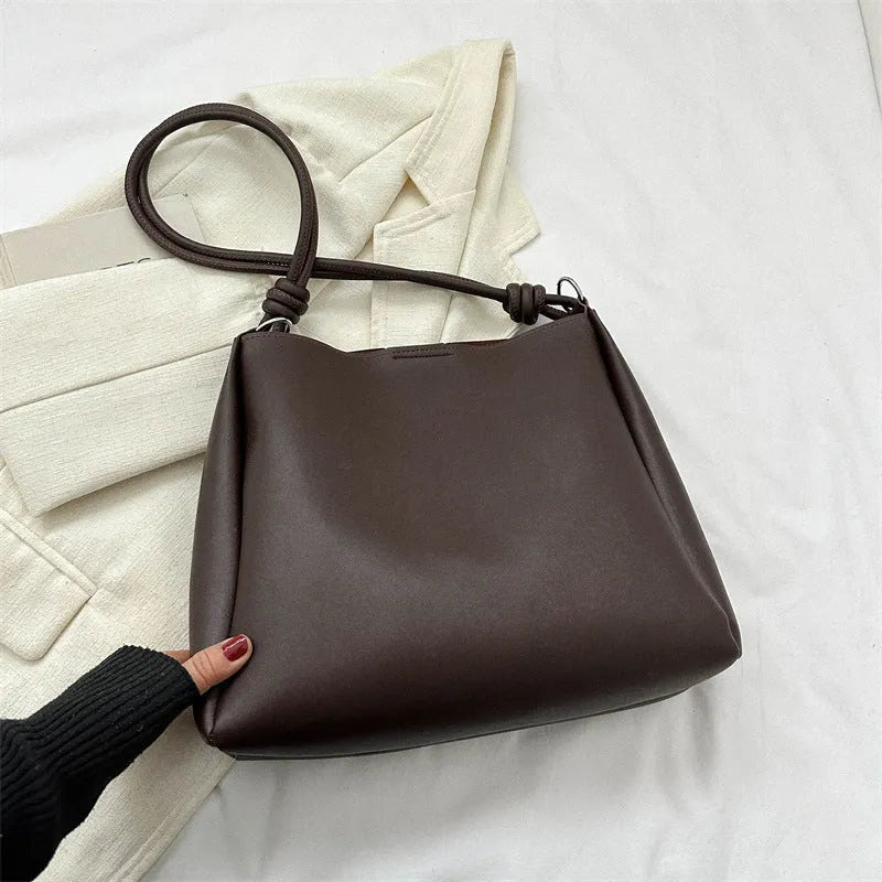 Women's crossbody tote bag in retro bucket shape, PU material, available in yellow brown, brown, black, khaki, with sewing line detail