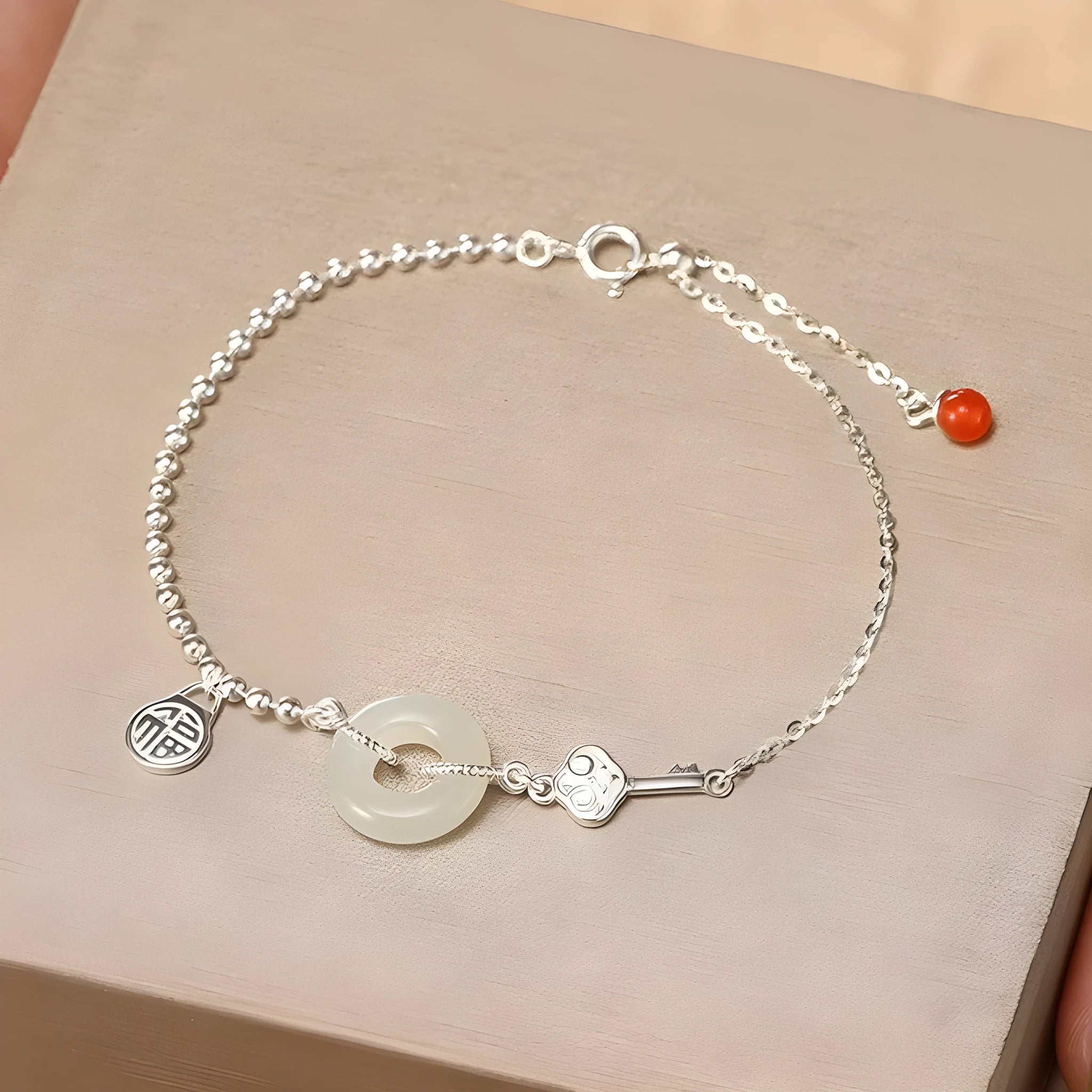 Women's Hetian jade bracelet with 925 silver peace buckle charm in traditional Chinese design