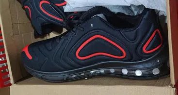 Men's black casual running shoes with a thick sole and lace-up front.