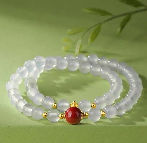 White agate women's bracelet with geometric double layer design featuring jequirity bean and cinnabar accents