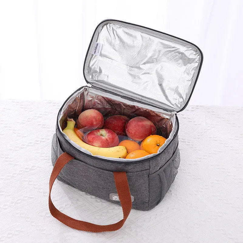 Insulated crossbody picnic bag in Oxford cloth with ice pack compartment and shoulder strap