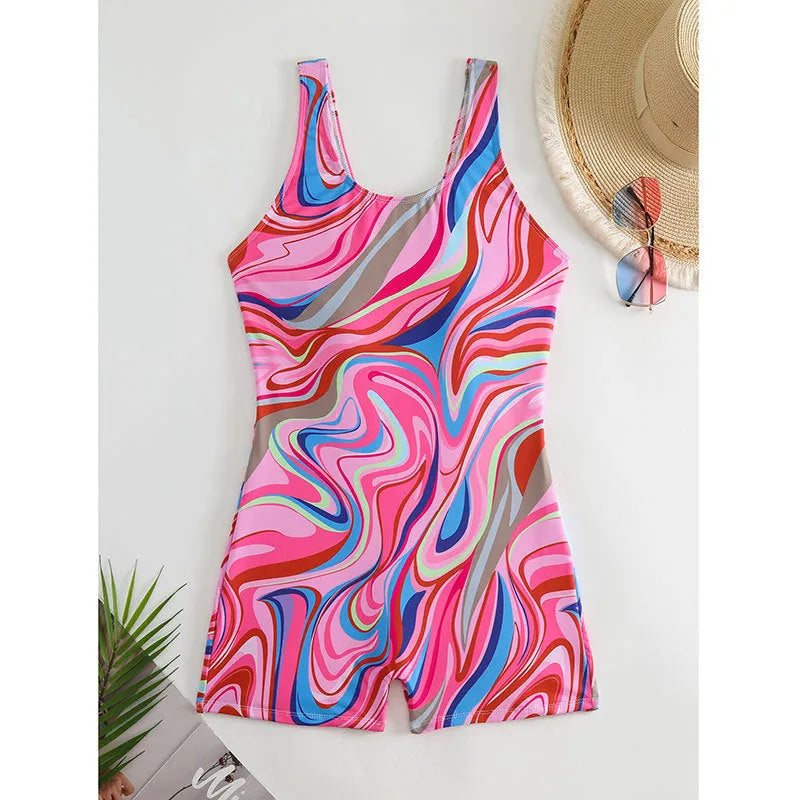 Women's high-waisted backless one-piece swimsuit with a printed pattern.