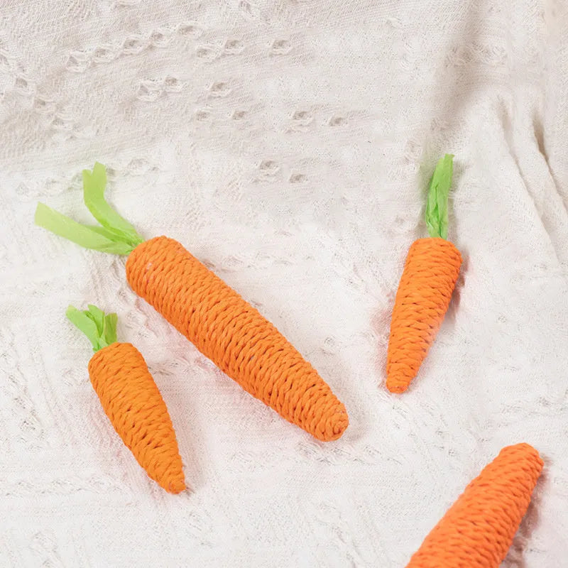 Set of interactive cat toys including carrot bites, paper toys with ringing stones, cat sticks, and tooth grinding sticks