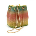 Colourful rainbow rhinestone bucket bag with a single shoulder strap.