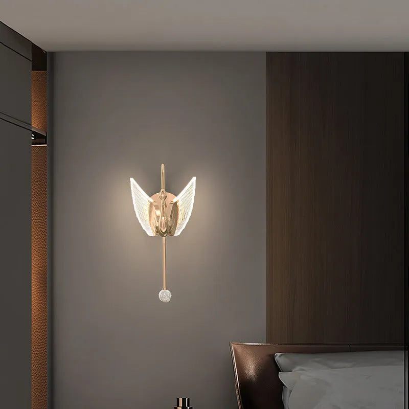 Gold modern swan-shaped bedside wall lamp with acrylic shade and dimmable LED lighting.