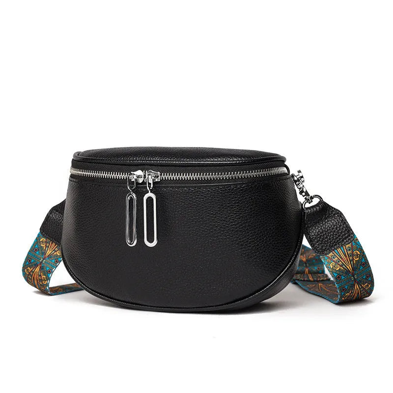 Women's saddle-shaped messenger bag in soft PU leather with cross-body strap and zippered compartment