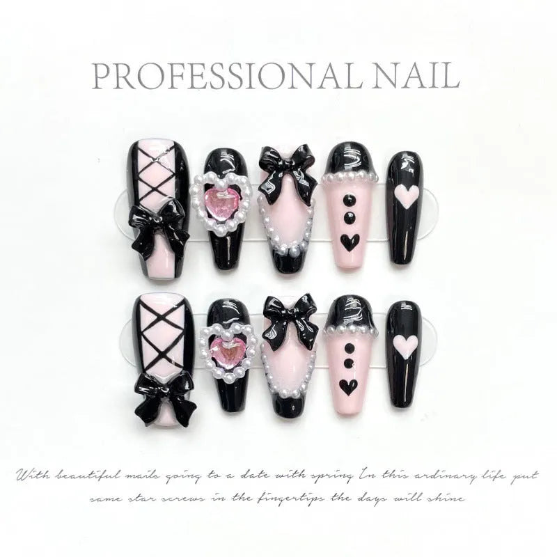 Black pink heart hand-painted artificial nails with bow patterns and cat's eye finish