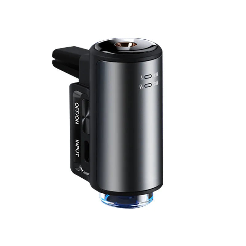 Smart car vent clip aroma diffuser in obsidian black with three bottles of essential oil