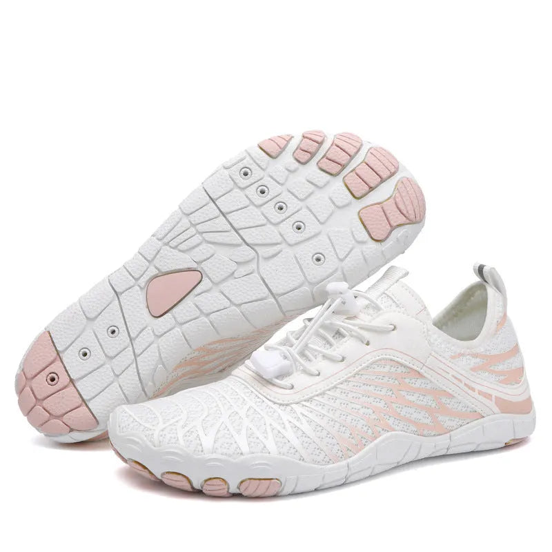 White breathable lace-up casual sports shoes with a non-slip rubber sole on a plain background.