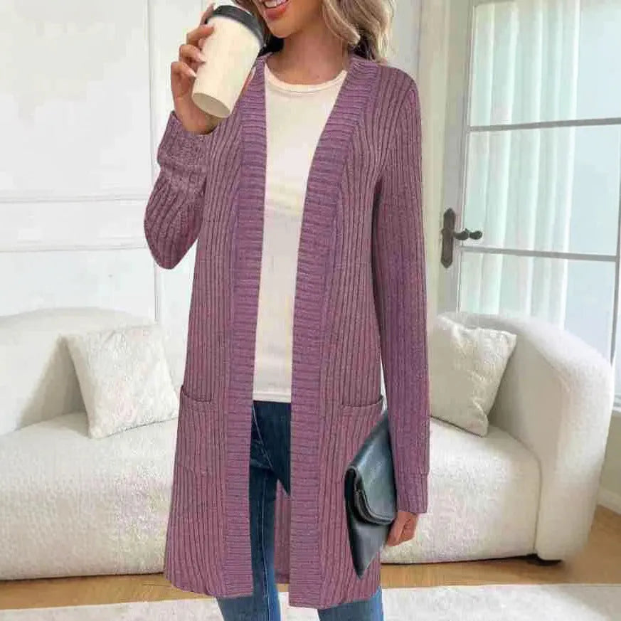 Women's plus size black knitted cardigan jacket with long sleeves and front pockets.