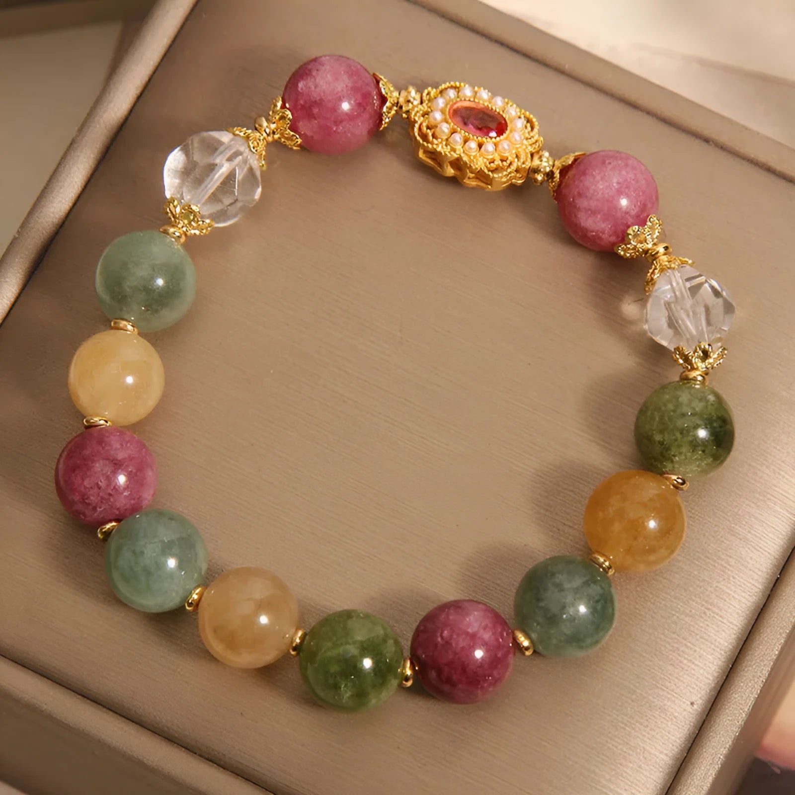 Jade colour tourmaline women's bracelet with alloy construction and rhinestone decorative elements
