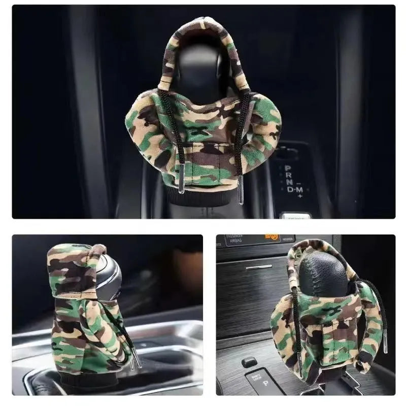 Grey camouflage polyester gear lever cover on car shift stick in sweater style