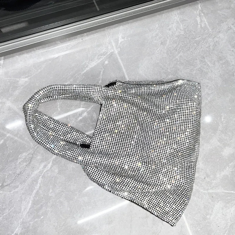 Silver cotton thread party handbag with rhinestone detailing and open outer pocket