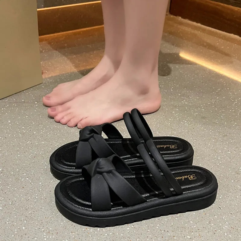 Women's black PVC outdoor sandals showing soft back thick back construction and two-way wear design